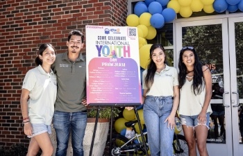 Dental team members at event for youth