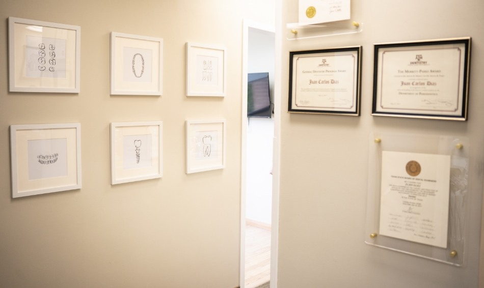 Awards and pictures on walls of dental office