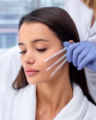 Female dental patient about to receive BOTOX for TMJ treatment